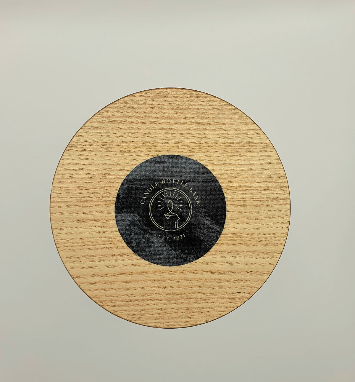 Candle Lid with The Candle Bottle Bank Logo sticker